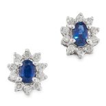 A PAIR OF SAPPHIRE AND DIAMOND STUD EARRINGS in 18ct white gold, each set with an oval cut