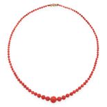 AN ANTIQUE CORAL BEAD NECKLACE in yellow gold, comprising a single row of one hundred and nine
