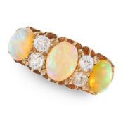 AN ANTIQUE OPAL AND DIAMOND DRESS, 1903 in 15 or 18ct yellow gold, set with a trio of gradated