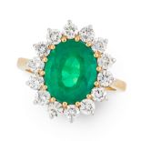 AN EMERALD AND DIAMOND DRESS RING in 18ct yellow gold, set with an oval cut emerald of 3.33 carats