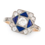 AN ART DECO DIAMOND AND ENAMEL DRESS RING in yellow gold and platinum, set with a central old cut