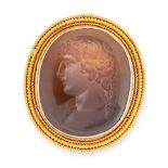 AN ANTIQUE INTAGLIO SEAL BROOCH in high carat yellow gold, the oval face set with a carved hardstone