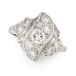 A DIAMOND CLUSTER DRESS RING designed with scrolling motifs, set with round cut diamonds, marked