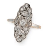 AN ART DECO DIAMOND RING in yellow gold and platinum, the elongated oval face set with a trio of old