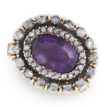 AN AMETHYST AND DIAMOND CLASP in yellow gold and silver, set with an oval cut amethyst within a