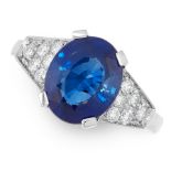 A SAPPHIRE AND DIAMOND RING in 18ct white gold, set with an oval cut sapphire of 4.04 carats between
