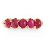 A RUBY DRESS RING in high carat yellow gold, set with a row of five graduated oval cabochon rubies