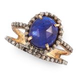 A SAPPHIRE AND DIAMOND RING set with a faceted topped cabochon sapphire accented by rose cut