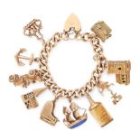 A VINTAGE CHARM BRACELET in yellow gold, comprising a curb link bracelet with heart shaped padlock