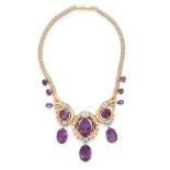 A VINTAGE AMETHYST AND DIAMOND NECKLACE in 18ct yellow gold, set with a trio oval cut amethyst