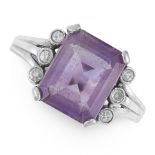 AN AMETHYST AND DIAMOND RING in white gold, set with a step cut amethyst between trios of round