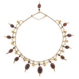 AN ANTIQUE GARNET NECKLACE, 19TH CENTURY in high carat yellow gold, the snake link chain