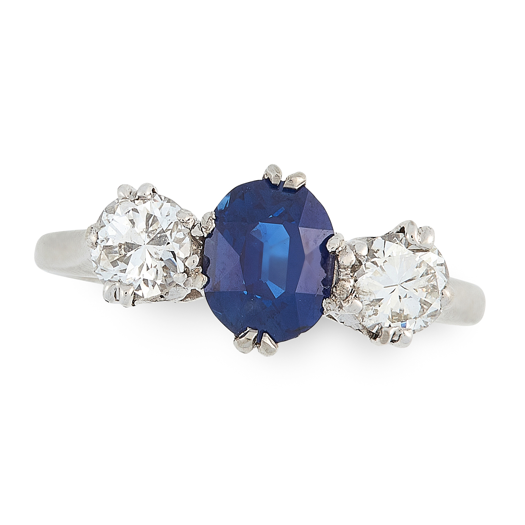 A SAPPHIRE AND DIAMOND DRESS RING set with an oval cut sapphire of 1.10 carats between two round cut