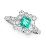 AN EMERALD AND DIAMOND DRESS RING set with an emerald cut emerald within a border of single cut