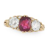 AN ANTIQUE RUBY AND DIAMOND DRESS RING in 18ct yellow gold, set with a cushion cut ruby between