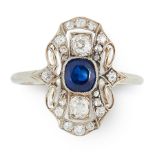AN ART DECO SAPPHIRE AND DIAMOND RING set with a cushion cut blue sapphires accented by two