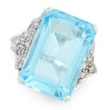 A BLUE TOPAZ AND DIAMOND RING in 18ct white gold, set with an emerald cut blue topaz of 23.84