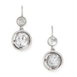 A PAIR OF DIAMOND DROP EARRINGS, EARLY 20TH CENTURY each set with an old cut diamond below two