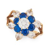 A GEMSET DRESS RING in 9ct yellow gold, set with a cluster of round cut white and blue gemstones,