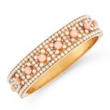 AN ANTIQUE CORAL AND DIAMOND BRACELET in 15ct yellow gold, the band half set with eight coral