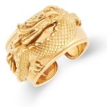 A DRAGON CUFF BANGLE in 18ct yellow gold, the articulated cuff of bevelled design, with applied
