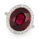A RUBELLITE TOURMALINE AND DIAMOND RING set with an oval cut rubellite tourmaline of 11.83 carats,