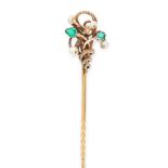 AN ANTIQUE PEARL AND EMERALD SNAKE TIE PIN in yellow gold, designed as a snake coiled around itself,