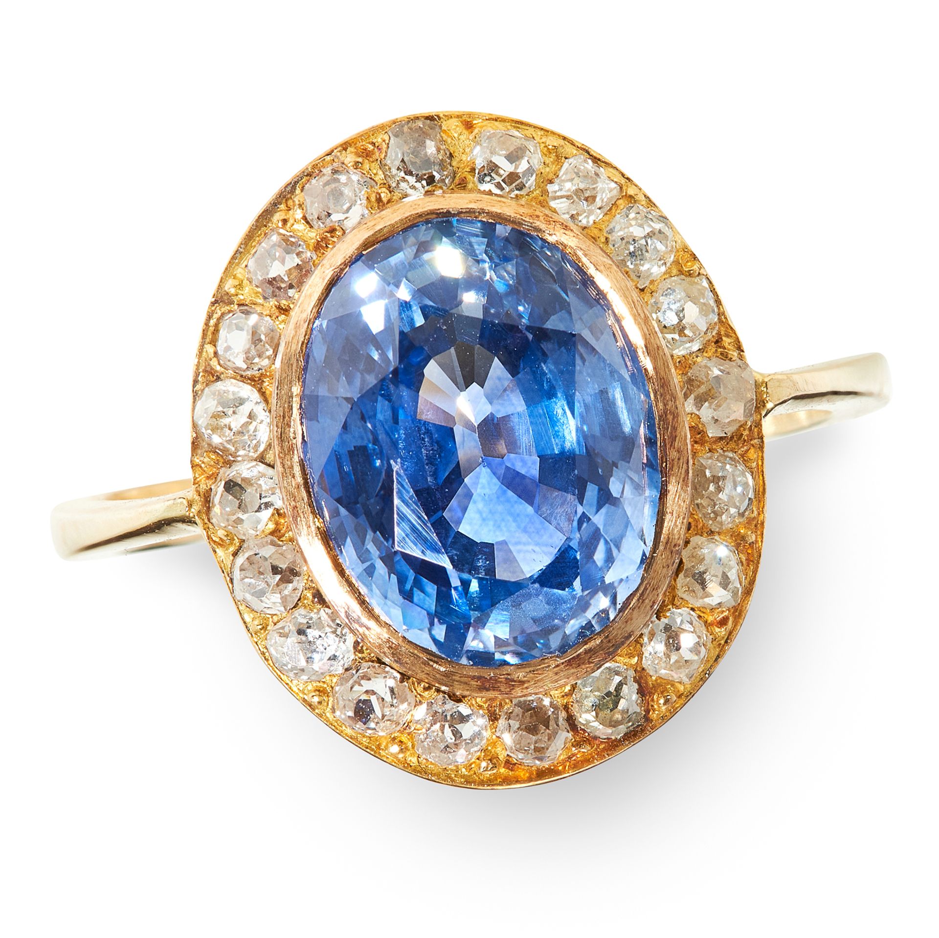 A 6.13 CARAT CEYLON NO HEAT SAPPHIRE AND DIAMOND CLUSTER RING in 18ct yellow gold, set with an