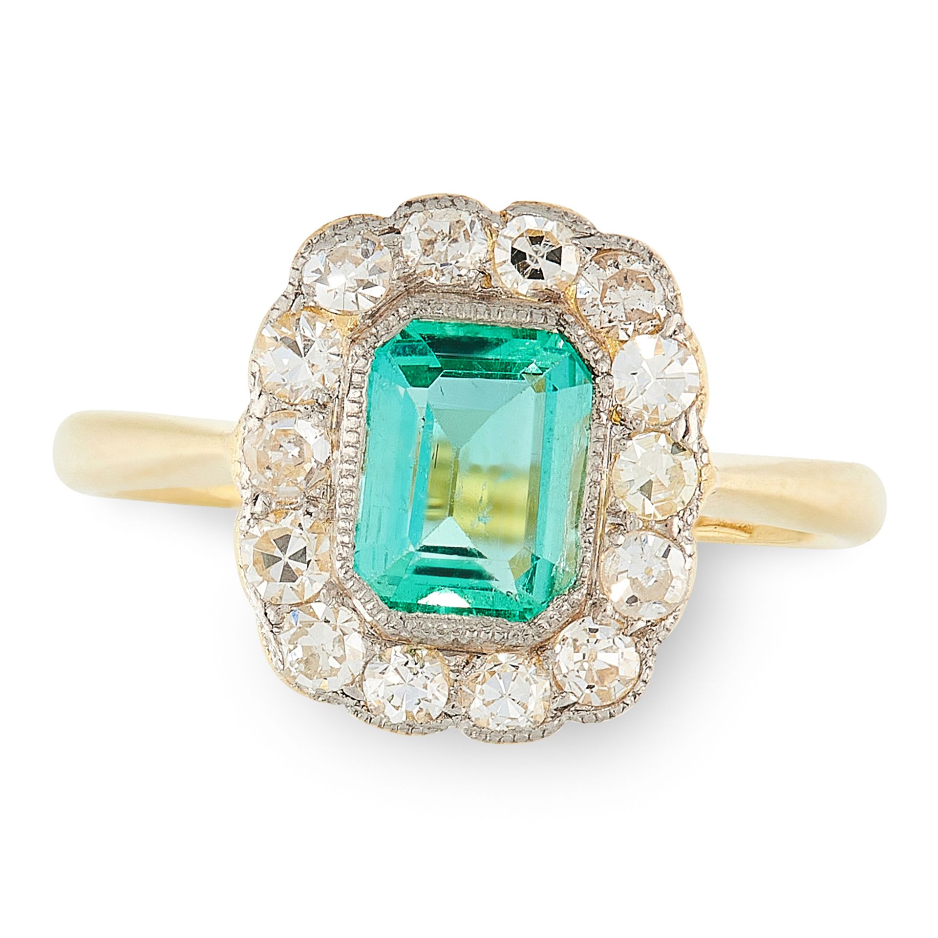 AN EMERALD AND DIAMOND CLUSTER RING in 18ct yellow gold, set with an emerald cut emerald of 0.64