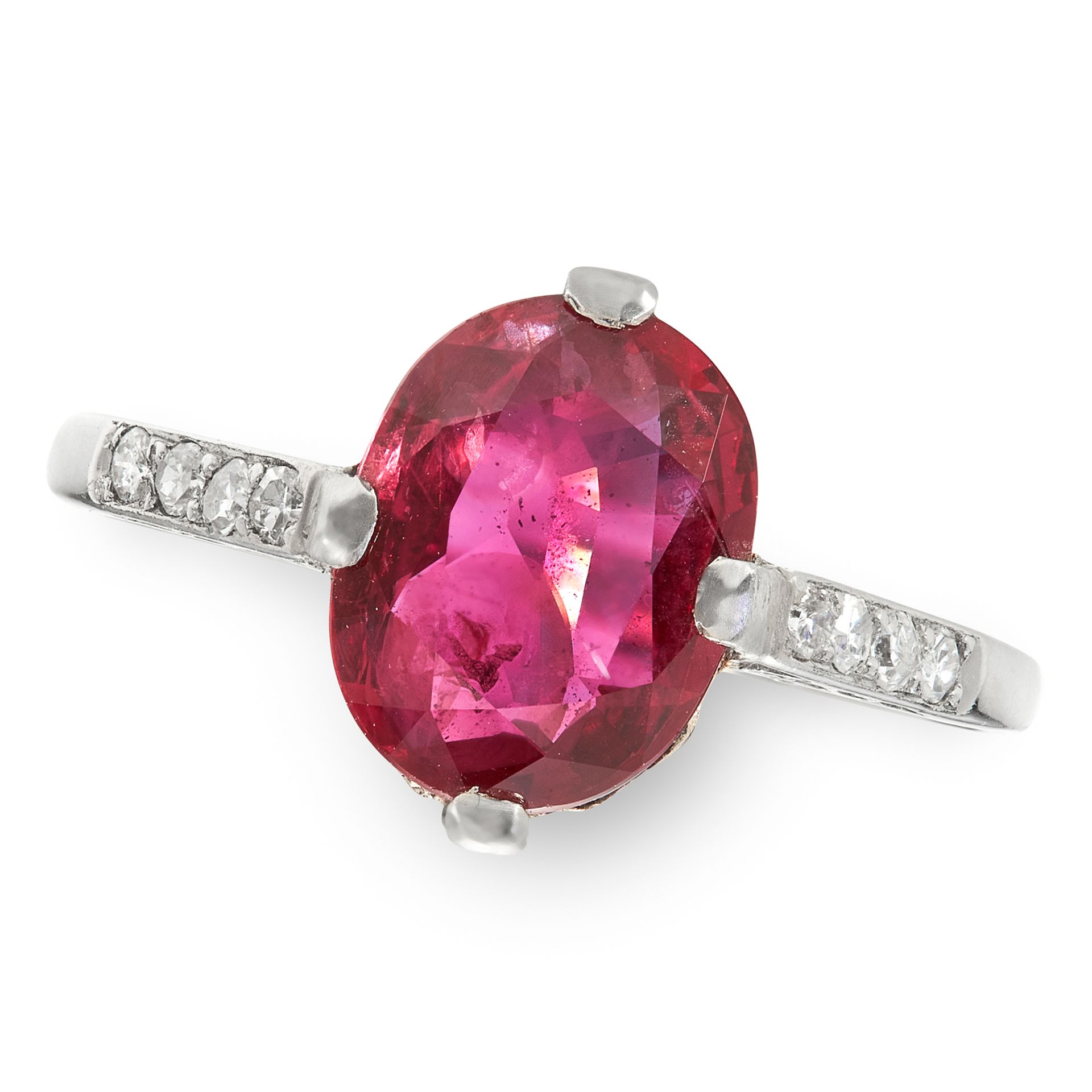 A 2.33 CARAT RUBY AND DIAMOND RING in platinum, set with an oval cut ruby of 2.33 carats with