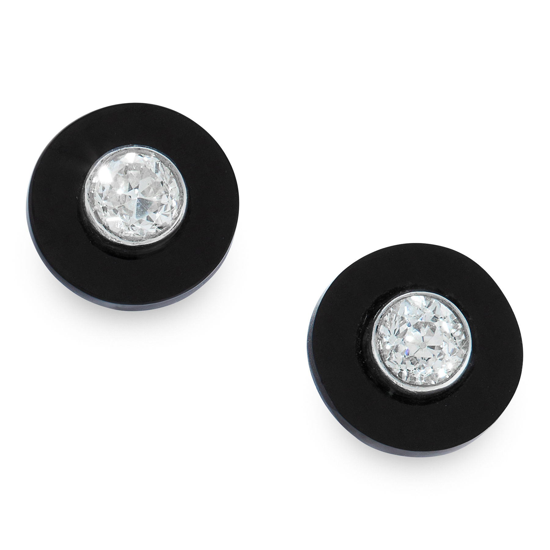 A PAIR OF ONYX AND DIAMOND STUD EARRINGS each formed of a circular piece of polished onyx set at the