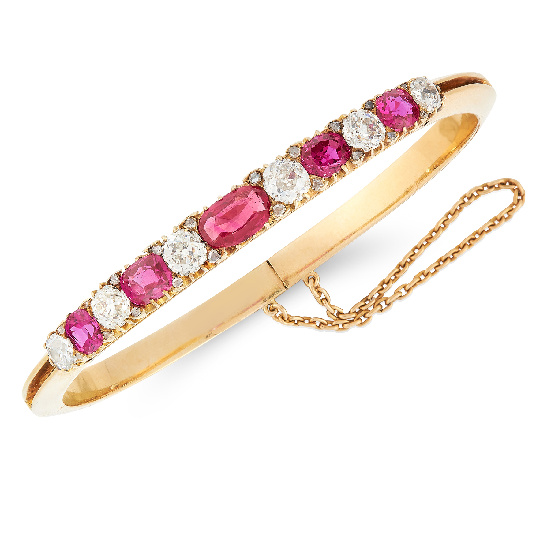 AN ANTIQUE BURMA NO HEAT RUBY AND DIAMOND BANGLE, LATE 19TH CENTURY in 18ct yellow gold, set with