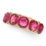 AN ANTIQUE EDWARDIAN RUBY AND DIAMOND FIVE STONE RING in 18ct yellow gold, set with five round and