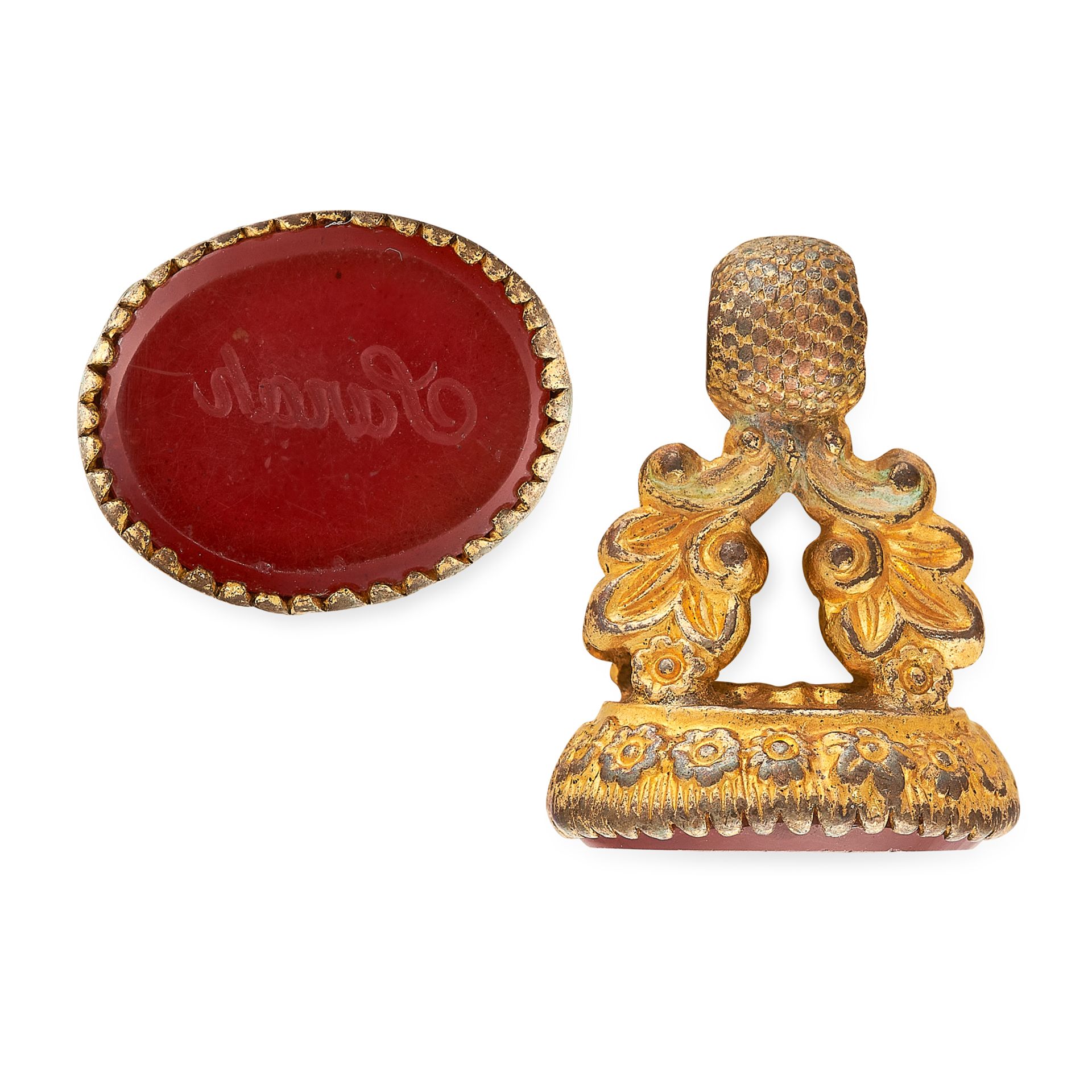 AN ANTIQUE CARNELIAN INTAGLIO FOB set with a carved carnelian in gold border, unmarked, 1.8cm, 3.