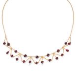 AN ANTIQUE GARNET FESTOON NECKLACE in 9ct yellow gold, suspending a graduated fringe of faceted