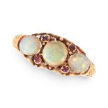 AN ANTIQUE OPAL AND RUBY DRESS RING in 18ct yellow gold, set with three cabochon opals and round cut