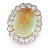 AN OPAL AND DIAMOND CLUSTER RING in white gold or platinum, set with an oval cabochon opal in a