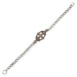 AN ANTIQUE DIAMOND BRACELET in silver, formed of a central openwork motif jewelled with rose cut