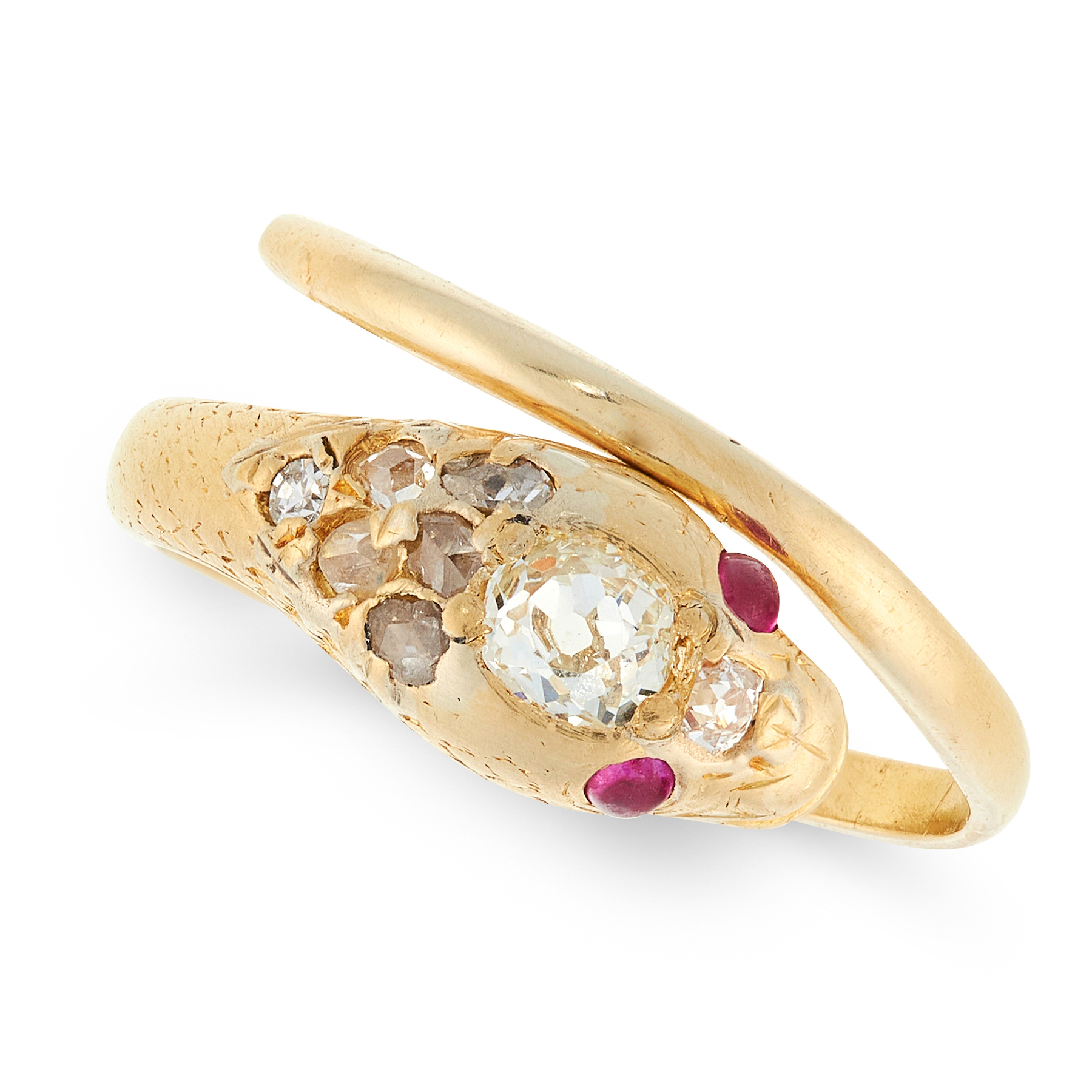 AN ANTIQUE DIAMOND AND RUBY SNAKE RING in high carat yellow gold, in the form of a snake, coiled