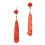 A PAIR OF ANTIQUE CORAL EARRINGS in yellow gold, set with a polished coral bead suspending a