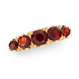 AN ANTIQUE GARNET FIVE STONE RING in 18ct yellow gold, set with five graduated round cut garnets,