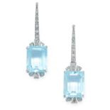 A PAIR OF BLUE TOPAZ AND DIAMOND EARRINGS in white gold, in Art Deco design, the tapering body set
