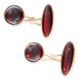 A PAIR OF ANTIQUE GARNET CUFFLINKS in yellow gold, each formed of two links, set with round and oval