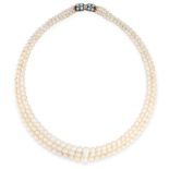 A THREE ROW PEARL NECKLACE comprising of three rows of graduated pearls on a clasp set with two