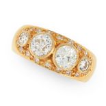 A DIAMOND DRESS RING in 18ct yellow gold, set with four central old cut diamonds, in an oval panel