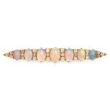 AN ANTIQUE OPAL AND DIAMOND BAR BROOCH in yellow gold, the tapering body set with a row of seven