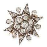 AN ANTIQUE DIAMOND STAR BROOCH / PENDANT in yellow gold and silver, designed as a star, set