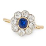 A SAPPHIRE AND DIAMOND DRESS RING in high carat yellow gold, set with a cushion cut blue sapphire of