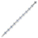 A SAPPHIRE AND DIAMOND BRACELET comprising a row of eleven navette motifs set with trios of