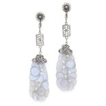 A PAIR OF ANTIQUE HARDSTONE EARRINGS in silver, each formed of a carved and polished piece of